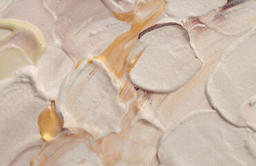 Art Acrylic smear blot brushstroke painting wall. Abstract texture beige color stain horizontal canvas background.