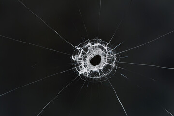 bullet hole on glass black background for overlay, transparent window