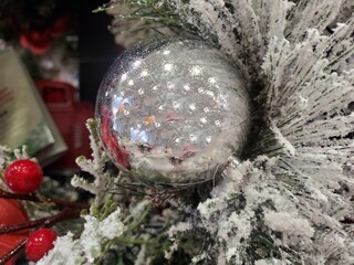 Close up of a glittering silver ball decoration for Christmas tree..