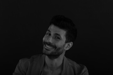 Fototapeta premium Romantic low key portrait of young man