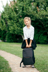 portrait of a schoolgirl. back to school