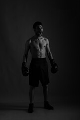 Fototapeta na wymiar Low key portrait of a boxer