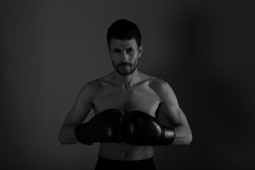 Fototapeta na wymiar Low key portrait of a boxer