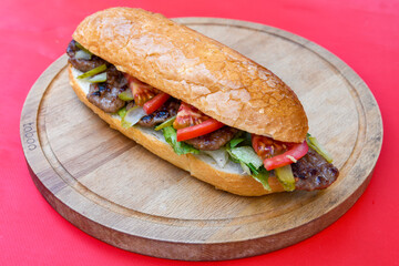 Meatball between bread (Turkish name : ekmek arasi kofte ) Izgara kofte. Manisa, Akcaabat, Akhisar  kofte