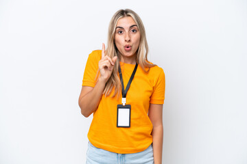 Young caucasian woman with ID card isolated on white background intending to realizes the solution while lifting a finger up