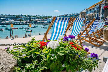 Fototapeta premium Deck chairs by the sea
