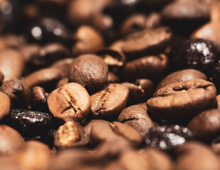 Closeup of burned coffee beans ready to be grinded