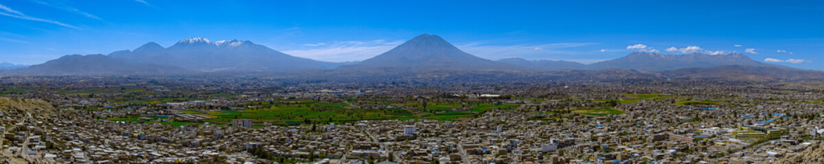 Fototapeta na wymiar panoramic view of peruvian city three volcanos arequipa misti chachani pichupichu