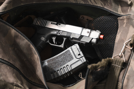 Airsoft gun with ammo inside a bag