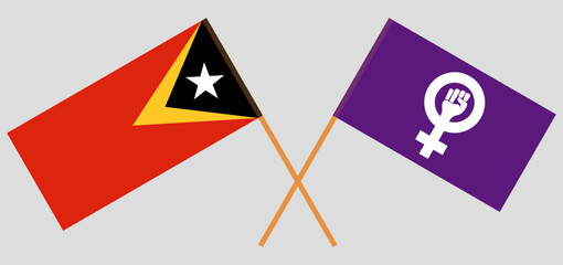 Crossed flags of East Timor and Feminism. Official colors. Correct proportion