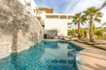 Sea hotel resort with swimming pool in the morning