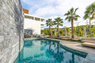 Sea hotel resort with swimming pool in the morning