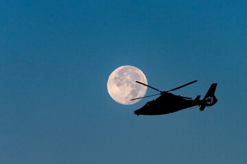 Full Moon and Helicopter Silhouette