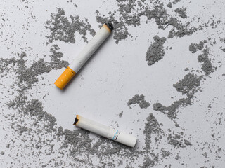 Cigarette and ashes on white background. Stop smoking, 