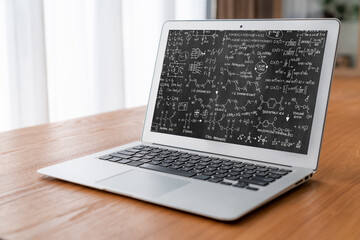 Mathematic equations and modish formula on computer screen showing concept of science and education