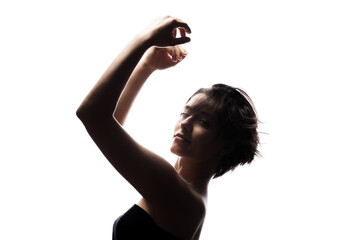 Half silhouette portrait of a girl with short hair and hands up. Isolated against white background....