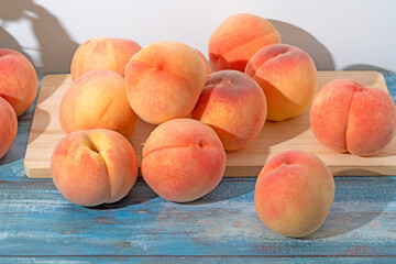 Fototapeta na wymiar Delicious and sweet pink peaches