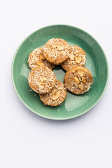 Amrit peda or Amrut pedha or pera is an Indian sweet made from milk and sugar with coconut topping