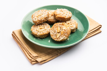 Amrit peda or Amrut pedha or pera is an Indian sweet made from milk and sugar with coconut topping