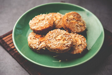Amrit peda or Amrut pedha or pera is an Indian sweet made from milk and sugar with coconut topping
