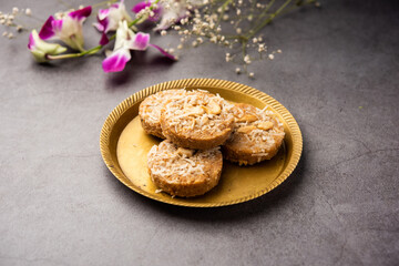 Amrit peda or Amrut pedha or pera is an Indian sweet made from milk and sugar with coconut topping