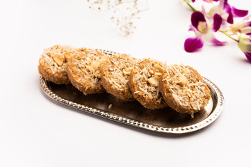 Amrit peda or Amrut pedha or pera is an Indian sweet made from milk and sugar with coconut topping