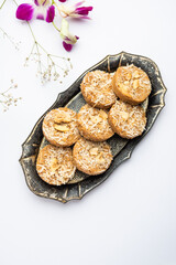Amrit peda or Amrut pedha or pera is an Indian sweet made from milk and sugar with coconut topping