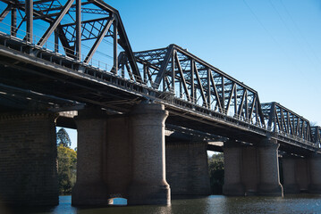 The Victoria Bridge, over Nepean River and officially known as The Nepean Bridge, is a heritage-listed former railway bridge on the Great Western Highway in the western Sydney suburb of Penrith. - obrazy, fototapety, plakaty