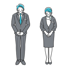 お辞儀をするコンシェルジュ（マスク姿）