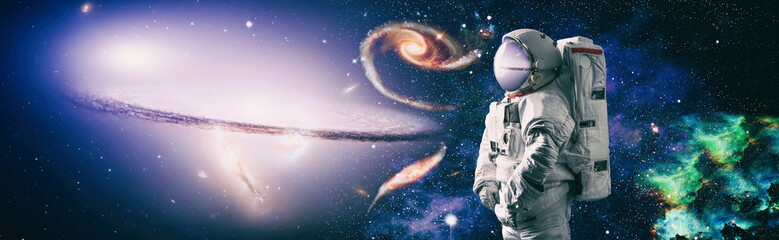 Astronaut in outer space.Cosmic art, science fiction wallpaper. Beauty of deep space. Elements of...