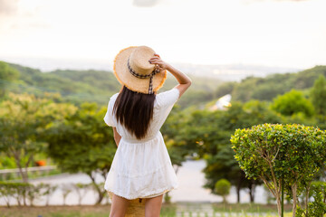 Tourist woman enjoy the view on mountain