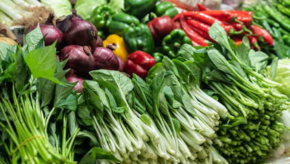 various of fresh green vegetables at the market  