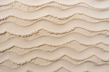 Wavy sand beach background for your travel design.