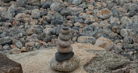 Fototapeta na wymiar Stone tower at the beach