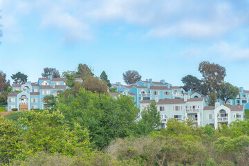 Fototapeta na wymiar Townhouses with balconies and blue interior at Carlsbad, San Diego, California