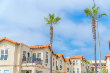 Complex apartment buildings with palm trees outdoors at Calsbad, San Diego, California
