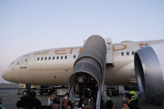 Etihad disembark passenger from the plane