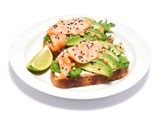 Freshly made Avocado, salmon and cream cheese toasts isolated on white background