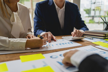 Teamwork with business people consultant describes a marketing plan to set business strategies. business budget planning and business research concept, Negotiation, Analysis, Discussion