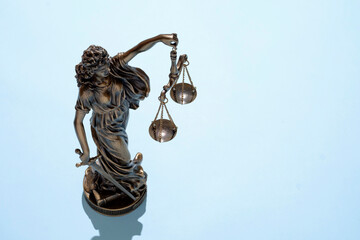 Themis statue is a symbol of the tribunal of freedom of the verdict of crime with balance scales on...