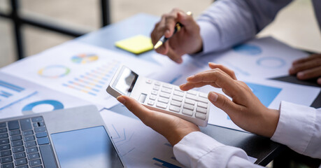 Bookkeeper diverse coworkers working together in the boardroom, brainstorming, discussing, and analyzing business strategy. Finance  concept