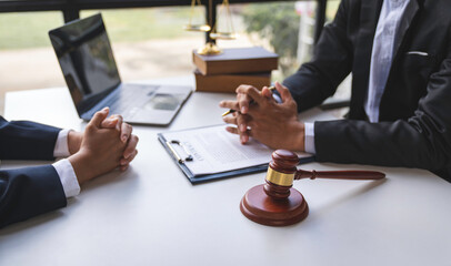 lawyer notary Male Notary lawyer or judge consult or discusses contract papers with Businessman...