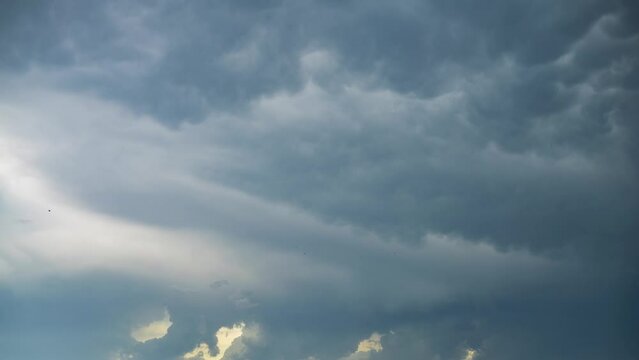 Rainy cloudscape time lapse with village. 4k video
