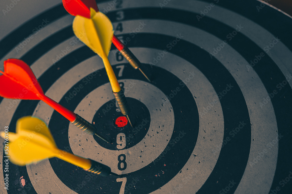 Poster bullseye is a target of business. dart is an opportunity and dartboard is the target and goal. so bo