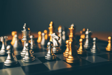 Chess board game to represent the business strategy with competition in the world market. and find out the best solution to meet target objective and goal. Sign and symbol of challenging as concept.