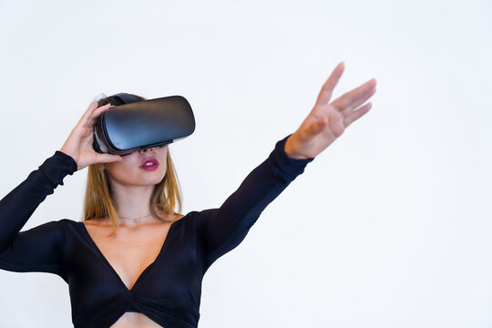 Woman With Virtual Reality Glasses On White Background, Futuristic Concept, Metaverse, Parallel Virtual Life