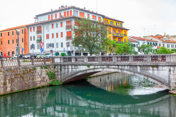 Fototapeta na wymiar Bridge over river Sile in Treviso Italy . Arch bridge in Italian city
