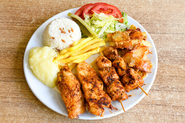 Chicken wings barbeque in a dish with BBQ grill sauce . Izgara tavuk kelebek sis kanat. Tavuk sis, gogus.