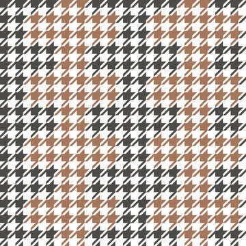 Seamless houndstooth pattern background with black white and brown. Vintage houndstooth texture for textile and fashion industry. Classic pattern for fashion print.