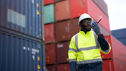 Container worker is doing his daily routine operation in the container yard